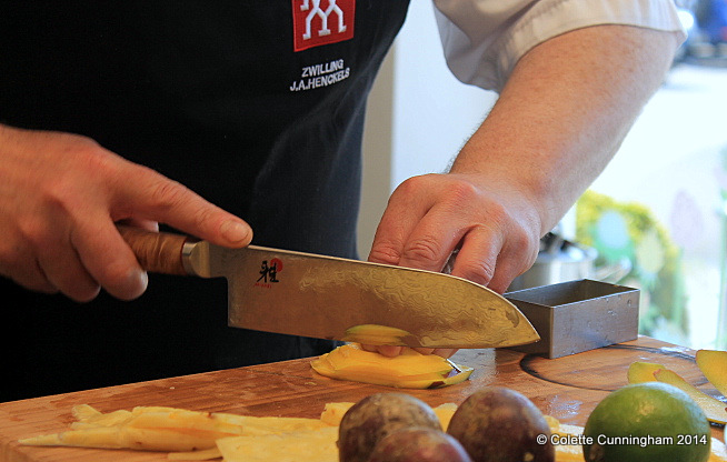 Preparing mango for Fruit Salad, using a knife from the Miyabi collection